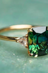 Gold ring with green zirconia