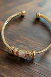 Adjustable Bracelet with Gold Charms