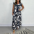 Zola | Women’s Abstract Print Maxi Jumpsuit with Flutter